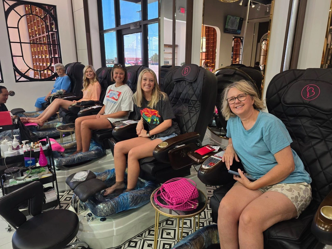 customers getting pedicure with relaxation at bnails