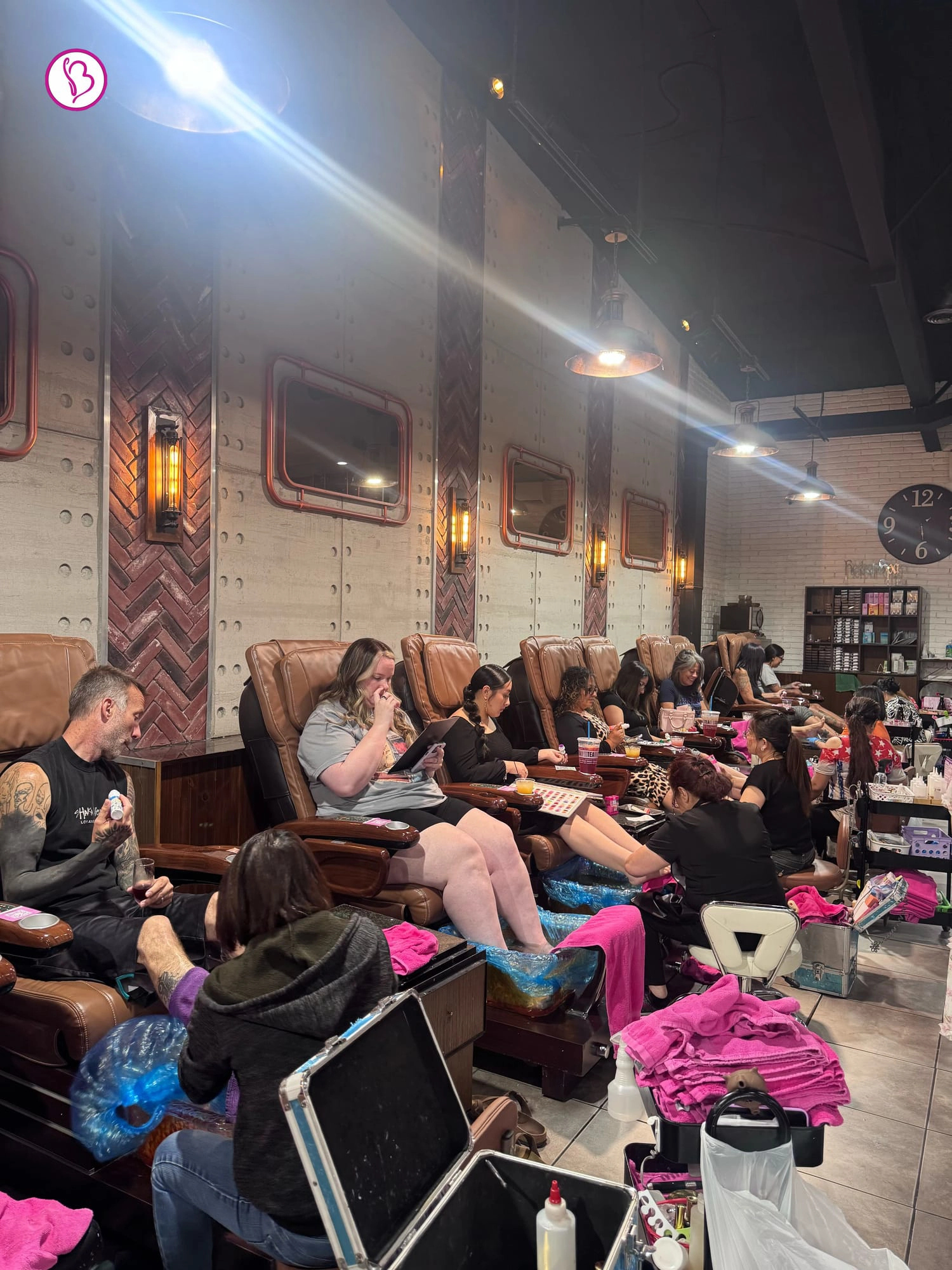 Bnails technician performing men’s pedicure using sterilized tools and single-use liner for hygiene