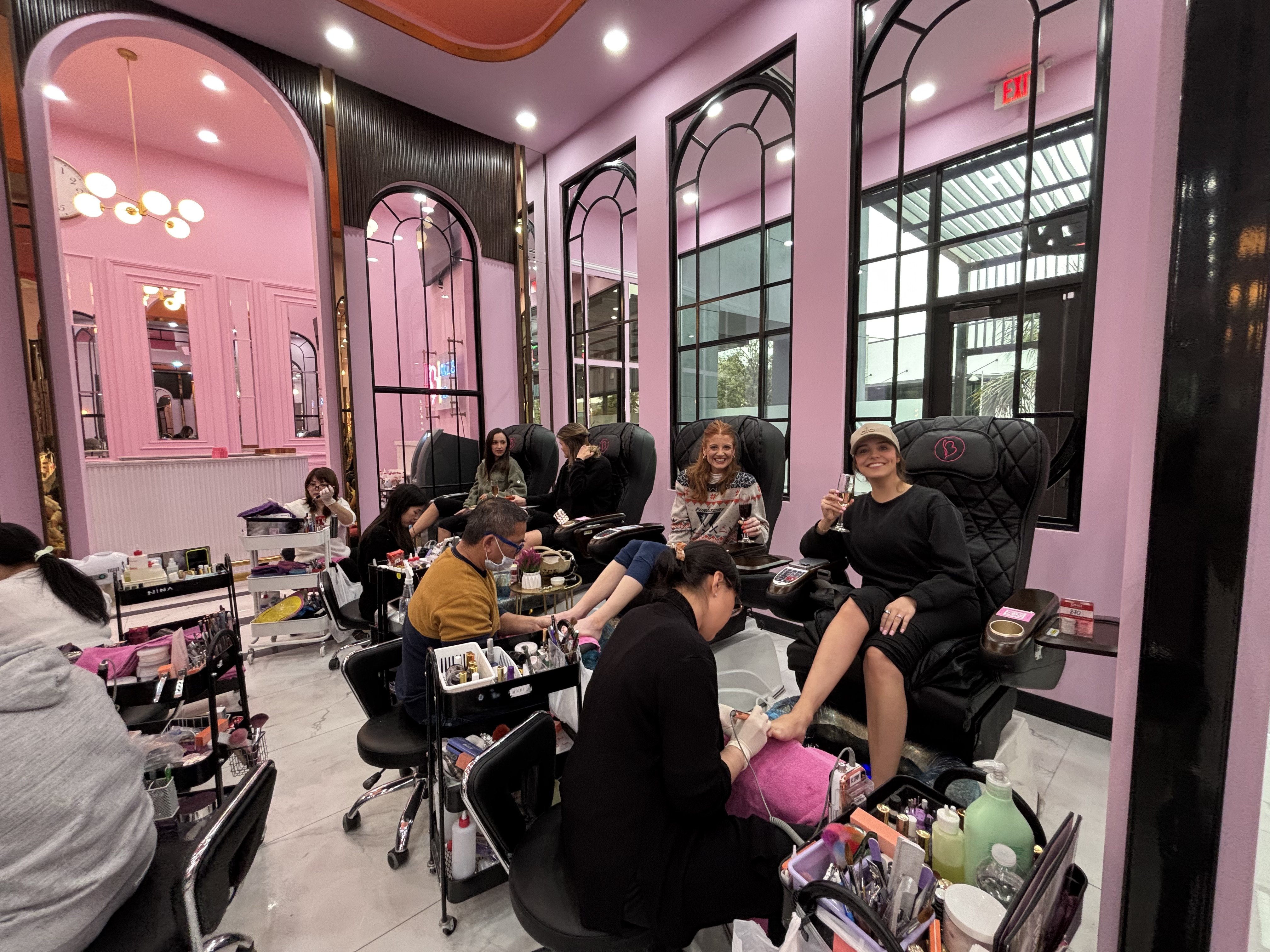 nail technician performing service with professional technique, nail salon in Cedar Park